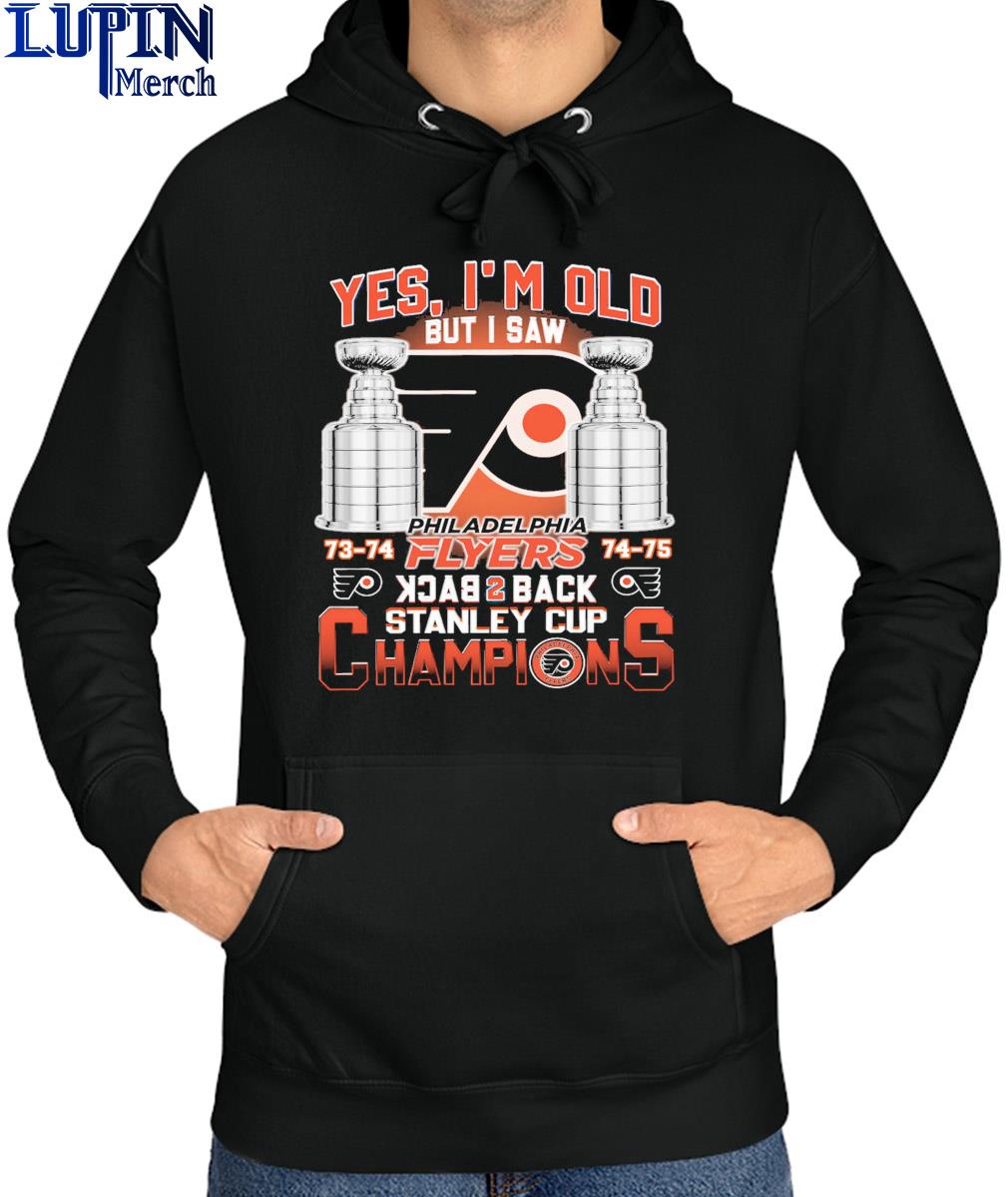 https://images.lupinmerch.com/2023/10/official-philadelphia-flyers-yes-im-old-but-i-saw-back-2-back-stanley-cup-champions-1973-1974-1975-trophy-shirt-Hoodie.jpg